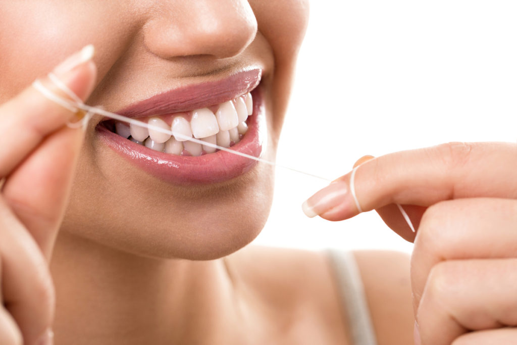 Can Flossing Loosen Teeth?
