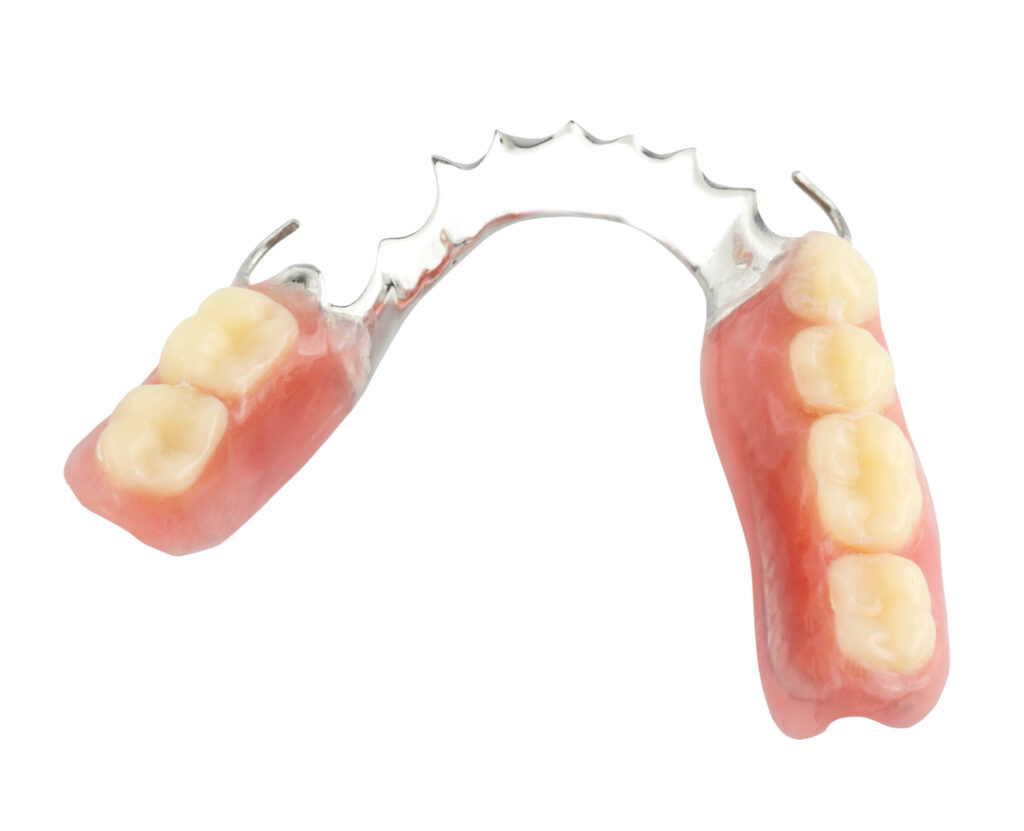 Getting To Know Your Dentures Better Partial Denture on white background. Your Dentures
