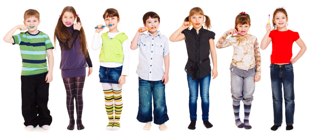 dental work for children
Cute preschool kids group cleaning teeth